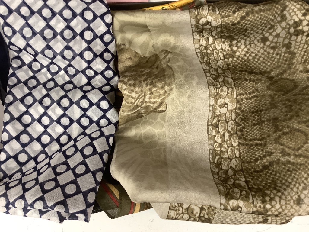 A collection of assorted late 20th century designer's silk scarves